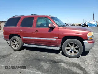 2003 GMC Yukon SLT z VIN 1GKEC13T53J319647, wystawiony jako Copart lot #49014225 z przebiegiem 298 601 mil mil oraz Czysty tytuł • Clean title. Historia ofert i sprzedaży dostępna na DreamBid. Obrazek 4.