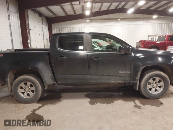 2020 Chevrolet Colorado 4WD Work Truck z VIN 1GCGTBEN2L1178464, wystawiony jako IAAI lot #42020876 z przebiegiem 111 698 mil mil oraz . Historia ofert i sprzedaży dostępna na DreamBid. Obrazek 13.