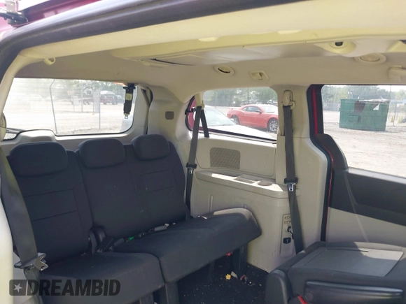 2010 Dodge Grand Caravan SXT with VIN 2D4RN5D17AR145958, listed as a IAAI auction lot 42125450 with 229,790 mi miles and . Bid and sale history available at DreamBid. Image 8.