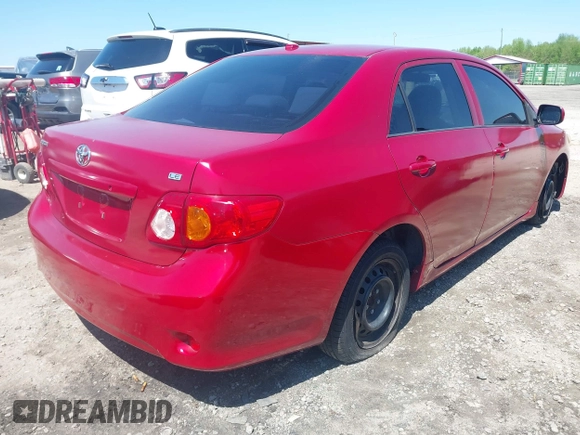2009 Toyota Corolla with VIN JTDBL40E999080233, listed as a IAAI auction lot 41995330 with 249,789 mi miles. Bid and sale history available at carsss.com. Image 4.