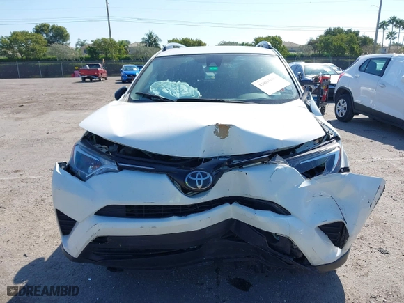 2017 Toyota RAV4 LE with VIN JTMZFREV7HJ143483, listed as a IAAI auction lot 41804683 with 129,319 mi miles. Bid and sale history available at carsss.com. Image 12.
