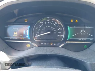 2015 Lincoln MKZ Hybrid with VIN 3LN6L2LUXFR606101, listed as a IAAI auction lot 41668806 with 77,112 mi miles. Bid and sale history available at carsss.com. Image 7.