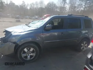2012 Honda Pilot EX-L with VIN 5FNYF4H75CB045693, listed as a IAAI auction lot 41795689 with 200,686 mi miles and . Bid and sale history available at DreamBid. Image 14.