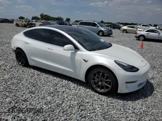 2019 Tesla Model 3 Long Range with VIN 5YJ3E1EB2KF391185, listed as a Copart auction lot 54151155 with 68,088 mi miles and Salvage Title. Bid and sale history available at carsss.com. Image 4.