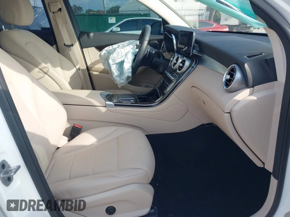 2022 Mercedes-Benz GLC 300 with VIN W1N0G8DB4NV395227, listed as a IAAI auction lot 42214509 with 14,886 mi miles and . Bid and sale history available at DreamBid. Image 5.
