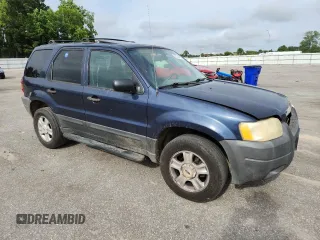 2003 Ford Escape XLT Popular with VIN 1FMCU03123KA03878, listed as a Copart auction lot 60133485 with 298,100 mi miles and Salvage title. Bid and sale history available at DreamBid. Image 4.