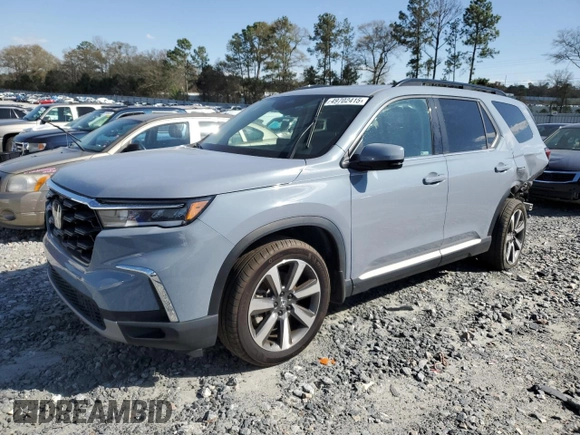 2024 Honda Pilot Touring with VIN 5FNYG2H79RB004803, listed as a Copart auction lot 49702415 with 27,406 mi miles and Salvage title. Bid and sale history available at DreamBid. Image 1.