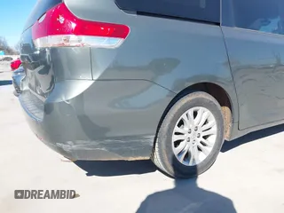 2013 Toyota Sienna XLE AAS with VIN 5TDYK3DCXDS379272, listed as a IAAI auction lot 41407282 with 240,491 mi miles and . Bid and sale history available at carsss.com. Image 17.