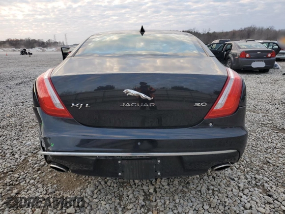 2016 Jaguar XJ Portfolio with VIN SAJWA2G71G8V95573, listed as a Copart auction lot 85975594 with 82,221 mi miles and Salvage title. Bid and sale history available at DreamBid. Image 6.