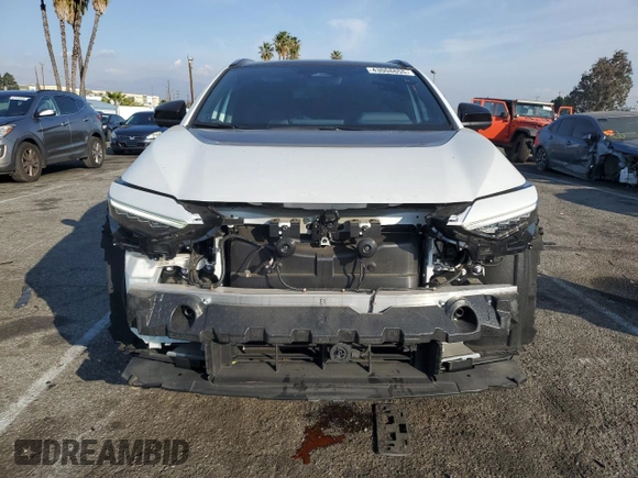 2024 Toyota bZ4X XLE with VIN JTMABACA6RA065029, listed as a Copart auction lot 43008655 with 15,489 mi miles and Salvage Title. Bid and sale history available at DreamBid. Image 5.