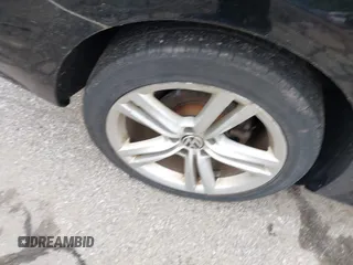 2014 Volkswagen Passat SE z VIN 1VWBT7A38EC037432, wystawiony jako IAAI lot #42347247 z przebiegiem 138 883 mil mil oraz . Historia ofert i sprzedaży dostępna na DreamBid. Obrazek 12.