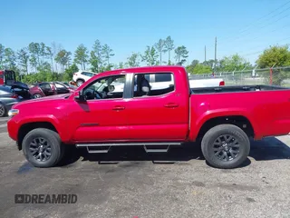 2022 Toyota Tacoma SR with VIN 3TMCZ5AN7NM470900, listed as a IAAI auction lot 42060911 with 38,869 mi miles and . Bid and sale history available at DreamBid. Image 14.