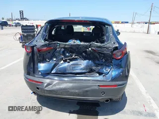 2021 Mazda CX-30 S with VIN 3MVDMAAL1MM270540, listed as a IAAI auction lot 42521513 with 63,993 mi miles and . Bid and sale history available at DreamBid. Image 6.