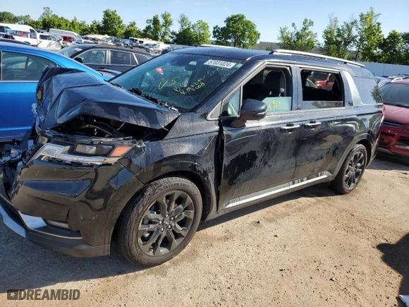2023 Kia Carnival SX Prestige with VIN KNDNE5H39P6211336, listed as a Copart auction lot 57031024 with 22,961 mi miles and Salvage Title. Bid and sale history available at carsss.com. Image 1.