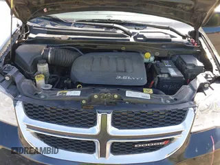 2014 Dodge Grand Caravan SXT with VIN 2C4RDGCG4ER341699, listed as a IAAI auction lot 42064523 with 234,422 mi miles and . Bid and sale history available at DreamBid. Image 10.