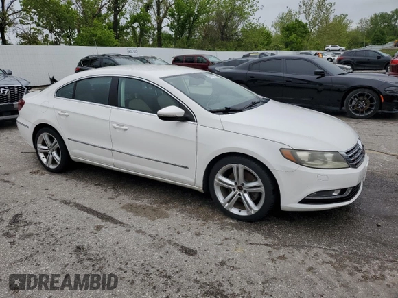 2013 Volkswagen CC Sport z VIN WVWBN7AN3DE515466, wystawiony jako Copart lot #56829715 z przebiegiem 171 667 mil mil oraz Czysty tytuł • Clean title. Historia ofert i sprzedaży dostępna na DreamBid. Obrazek 4.