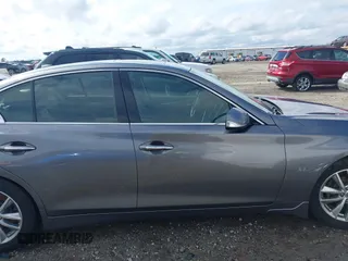 2015 Infiniti Q50 with VIN JN1BV7AP2FM332816, listed as a IAAI auction lot 41864532 with 180,683 mi miles. Bid and sale history available at carsss.com. Image 13.
