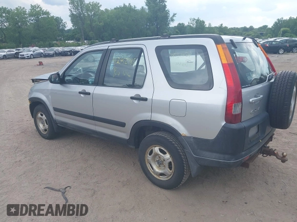 2002 Honda CR-V LX z VIN JHLRD78562C081322, wystawiony jako IAAI lot #42452985 z przebiegiem 193 011 mil mil oraz . Historia ofert i sprzedaży dostępna na DreamBid. Obrazek 3.