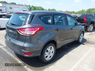 2015 Ford Escape S with VIN 1FMCU0F74FUB44251, listed as a IAAI auction lot 42070338 with 201,207 mi miles and . Bid and sale history available at DreamBid. Image 4.