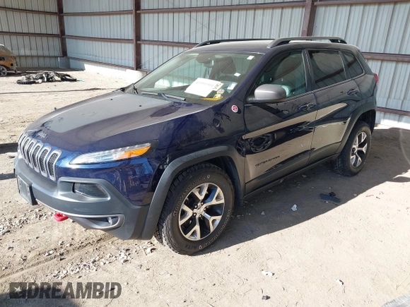 2015 Jeep Cherokee Trailhawk with VIN 1C4PJMBB1FW520649, listed as a IAAI auction lot 41991904 with 168,533 mi miles and . Bid and sale history available at DreamBid. Image 18.