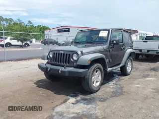 2016 Jeep Wrangler Black Bear with VIN 1C4AJWAGXGL258874, listed as a IAAI auction lot 42497153 with 93,294 mi miles and . Bid and sale history available at DreamBid. Image 2.