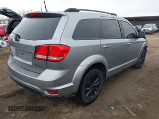 2019 Dodge Journey SE with VIN 3C4PDCBG9KT869149, listed as a IAAI auction lot 41472289 with 97,333 mi miles and . Bid and sale history available at DreamBid. Image 4.