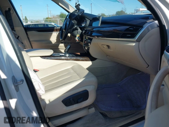 2014 BMW X5 sDrive35i with VIN 5UXKR2C54E0C01376, listed as a IAAI auction lot 41647680 with 50,941 mi miles. Bid and sale history available at carsss.com. Image 5.