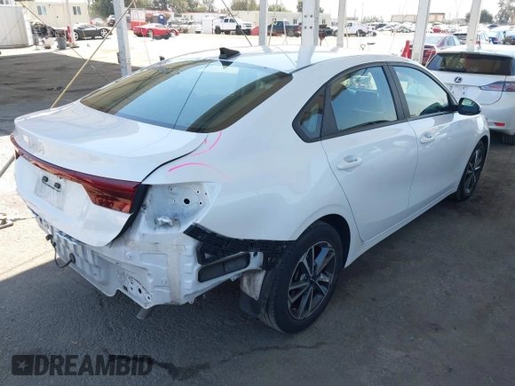 2023 Kia Forte LXS with VIN 3KPF24AD9PE578435, listed as a IAAI auction lot 41980894 with 59,817 mi miles and . Bid and sale history available at DreamBid. Image 4.