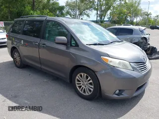 2015 Toyota Sienna XLE with VIN 5TDYK3DC3FS556859, listed as a IAAI auction lot 42161107 with 200,502 mi miles and . Bid and sale history available at DreamBid. Image 1.