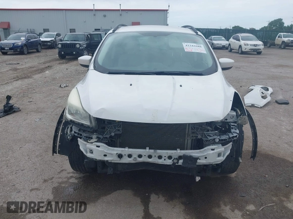 2014 Ford Escape SE with VIN 1FMCU9GX2EUA62133, listed as a IAAI auction lot 42342688 with Not provided miles and . Bid and sale history available at DreamBid. Image 13.