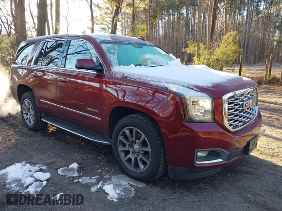 2019 GMC Yukon Denali with VIN 1GKS2CKJ8KR137636, listed as a IAAI auction lot 41264171 with 153,136 mi miles. Bid and sale history available at carsss.com. Image 1.