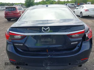 2015 Mazda 6 i Grand Touring with VIN JM1GJ1W53F1200121, listed as a IAAI auction lot 42173036 with 76,184 mi miles and . Bid and sale history available at DreamBid. Image 6.