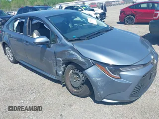 2023 Toyota Corolla LE z VIN JTDB4MEE7PJ002731, wystawiony jako IAAI lot #42155242 z przebiegiem 53 394 mil mil oraz . Historia ofert i sprzedaży dostępna na DreamBid. Obrazek 1.