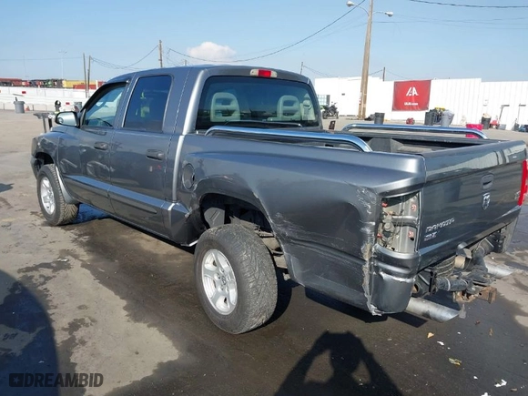 2005 Dodge Dakota SLT with VIN 1D7HE48N75S365305, listed as a IAAI auction lot 41450254 with 181,941 mi miles. Bid and sale history available at carsss.com. Image 6.