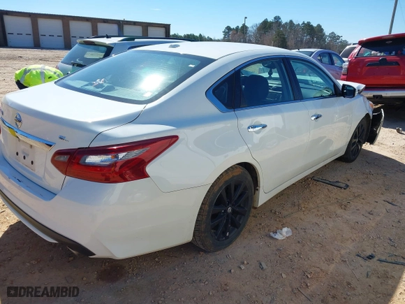 2018 Nissan Altima 2.5 SL with VIN 1N4AL3AP1JC163884, listed as a IAAI auction lot 41645283 with 115,982 mi miles. Bid and sale history available at carsss.com. Image 4.