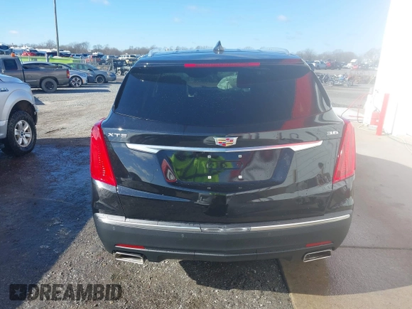 2017 Cadillac XT5 Luxury FWD with VIN 1GYKNBRS5HZ164209, listed as a IAAI auction lot 41213572 with 144,039 mi miles. Bid and sale history available at carsss.com. Image 16.