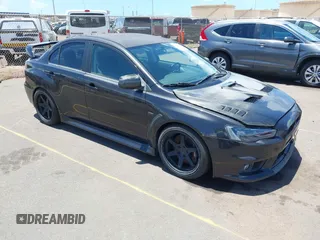 2010 Mitsubishi Lancer Evolution SE z VIN JA32W6FV8AU033849, wystawiony jako IAAI lot #42529161 z przebiegiem 93 830 mil mil oraz . Historia ofert i sprzedaży dostępna na DreamBid. Obrazek 1.