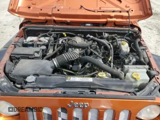 2011 Jeep Wrangler Sport with VIN 1J4AA2D15BL574234, listed as a Copart auction lot 52952605 with 114,642 mi miles and Salvage Title. Bid and sale history available at carsss.com. Image 11.