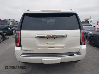 2015 GMC Yukon Denali with VIN 1GKS2CKJ9FR294551, listed as a IAAI auction lot 42162654 with 106,063 mi miles. Bid and sale history available at carsss.com. Image 17.
