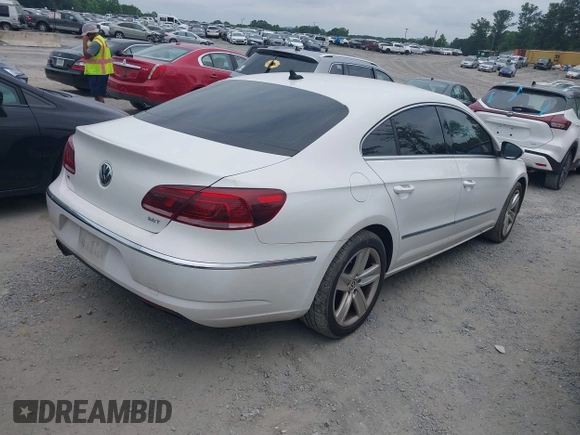 2014 Volkswagen CC R-Line with VIN WVWBP7AN7EE534565, listed as a IAAI auction lot 42477774 with 85,539 mi miles and . Bid and sale history available at DreamBid. Image 4.