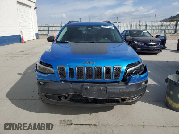 2019 Jeep Cherokee Trailhawk z VIN 1C4PJMBX5KD122328, wystawiony jako Copart lot #54066865 z przebiegiem 59 924 mil mil oraz Szkoda całkowita • Salvage title. Historia ofert i sprzedaży dostępna na DreamBid. Obrazek 5.