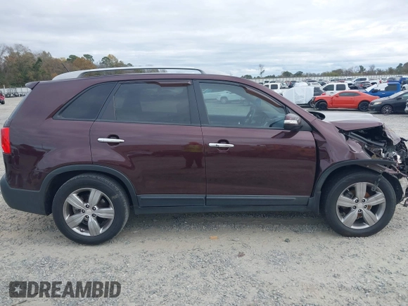 2013 Kia Sorento EX with VIN 5XYKU4A21DG312753, listed as a IAAI auction lot 41033124 with 197,459 mi miles and . Bid and sale history available at carsss.com. Image 13.