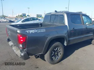 2019 Toyota Tacoma SR with VIN 3TMCZ5AN7KM251625, listed as a IAAI auction lot 42527478 with 45,689 mi miles and . Bid and sale history available at DreamBid. Image 4.