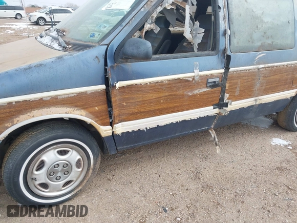1991 Dodge Grand Caravan with VIN 1B4GK54R4MX558183, listed as a IAAI auction lot 41604086 with 210,400 mi miles and . Bid and sale history available at DreamBid. Image 6.