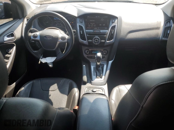 2014 Ford Focus Titanium with VIN 1FADP3N27EL251229, listed as a Copart auction lot 62201195 with 75,534 mi miles and Salvage title. Bid and sale history available at DreamBid. Image 8.