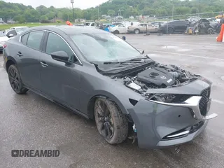 2023 Mazda 3 Premium Plus with VIN 3MZBPBEY6PM353118, listed as a IAAI auction lot 42214522 with Not provided miles and . Bid and sale history available at DreamBid. Image 1.