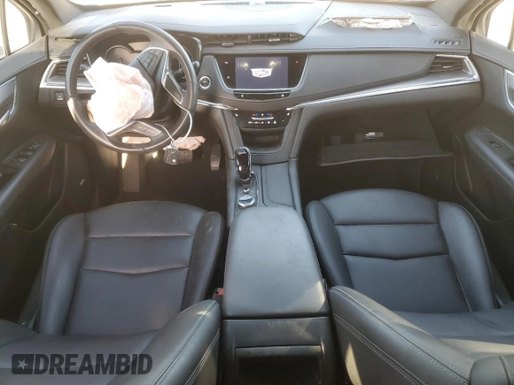 2023 Cadillac XT5 FWD Luxury z VIN 1GYKNAR49PZ174591, wystawiony jako Copart lot #52144985 z przebiegiem 20 005 mil mil oraz Szkoda całkowita • Salvage title. Historia ofert i sprzedaży dostępna na DreamBid. Obrazek 8.