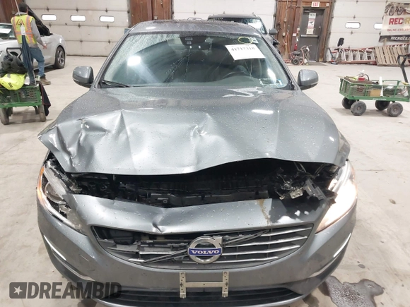 2016 Volvo S60 T5 Premier z VIN YV1612TK0G2410743, wystawiony jako IAAI lot #41717318 z przebiegiem 87 087 mil mil oraz . Historia ofert i sprzedaży dostępna na DreamBid. Obrazek 12.