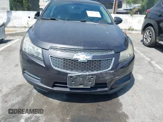 2014 Chevrolet Cruze LS z VIN 1G1PA5SG1E7405326, wystawiony jako IAAI lot #42095319 z przebiegiem Nie podano mil oraz . Historia ofert i sprzedaży dostępna na DreamBid. Obrazek 11.