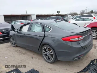 2017 Ford Fusion Titanium with VIN 3FA6P0K93HR416160, listed as a IAAI auction lot 41636451 with 100,383 mi miles. Bid and sale history available at carsss.com. Image 3.